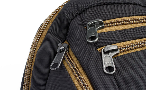 A close shot of the Coyote (brown) zippers and trim of the Guide's Edition Synapse 25.